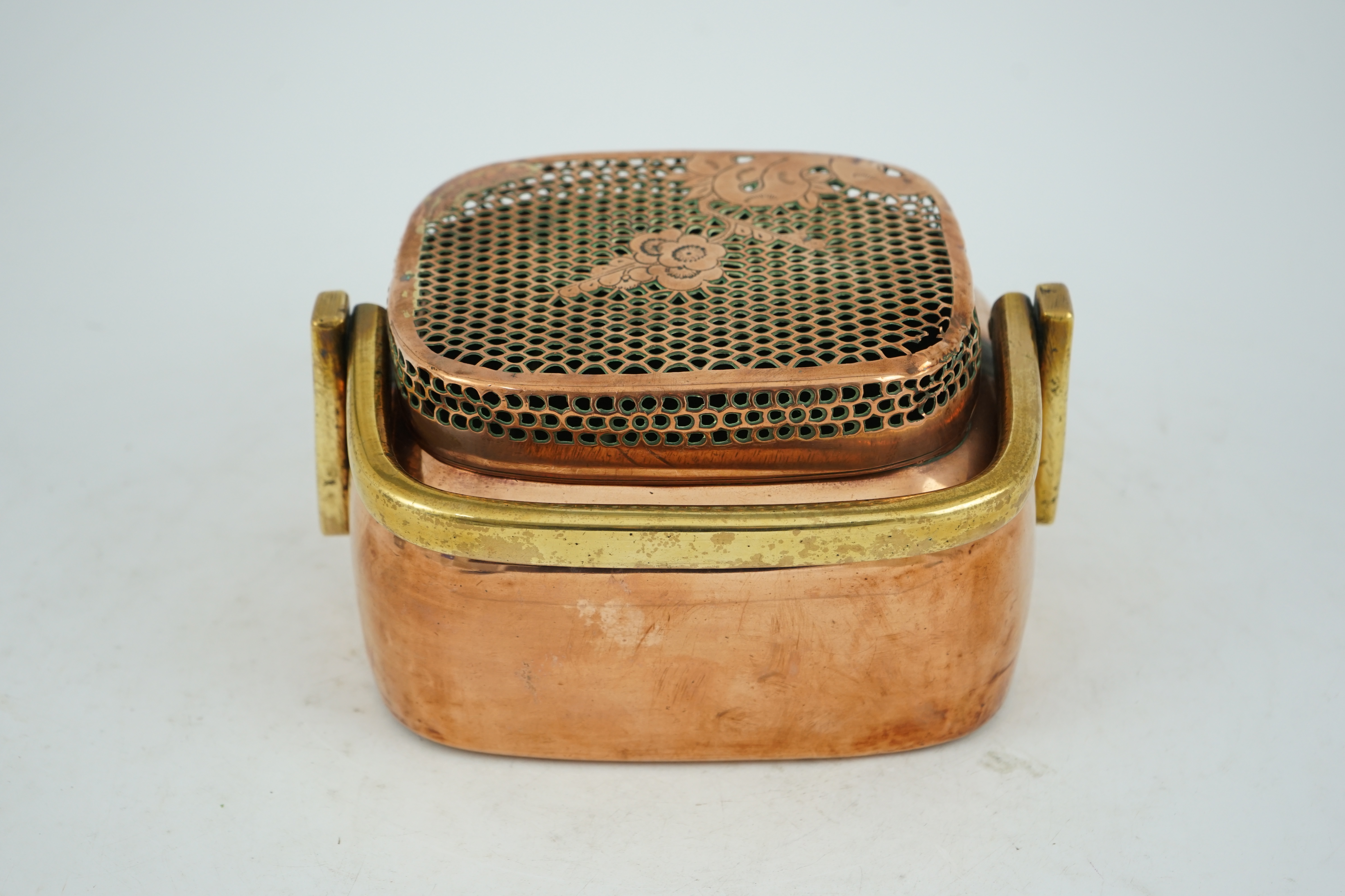 A Chinese copper alloy hand warmer, 18th century